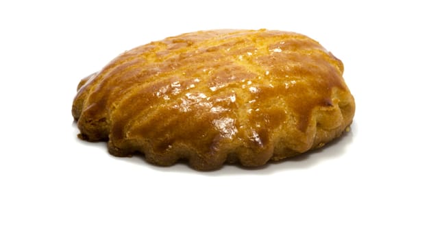 one piece of apple cake isolated on white