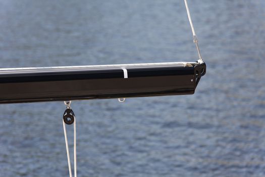 modern boom rope pulley, isolated against sea