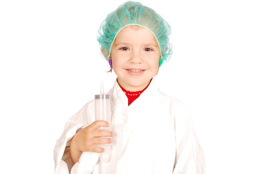 Little girl doctor with big syringe