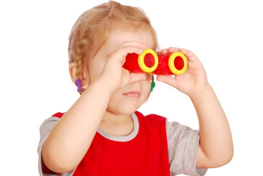 Little girl with binoculars studio shot