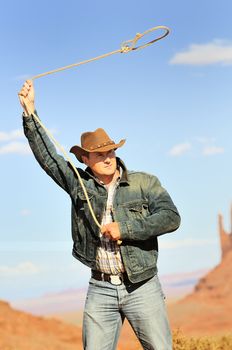 OUT WEST - A cowboy takes time to rest and reflect. 