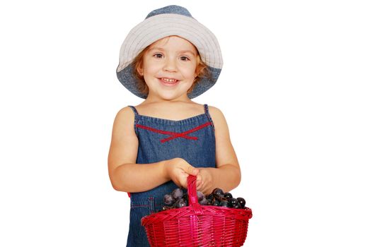 Little girl holding basket with grape studio shot