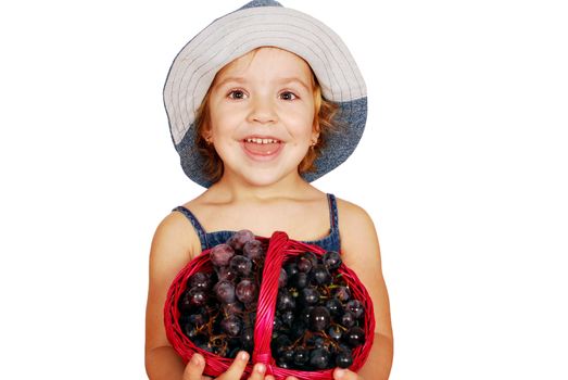 Beauty little girl with grapes