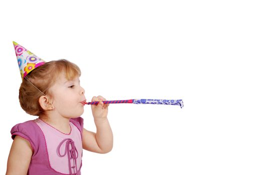Little girl with birthday hat and trumpet studio shot
