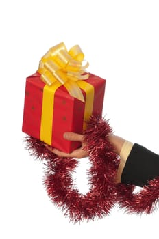 woman giving a red box with yellow bow as a gift
