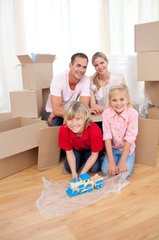 Animated children playing with a train while moving house