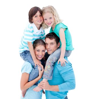 Loving parents giving their children piggyback ride against a white background