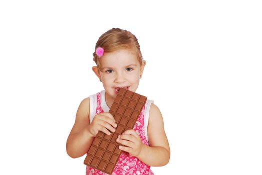 Little girl eat large chocolate studio shot