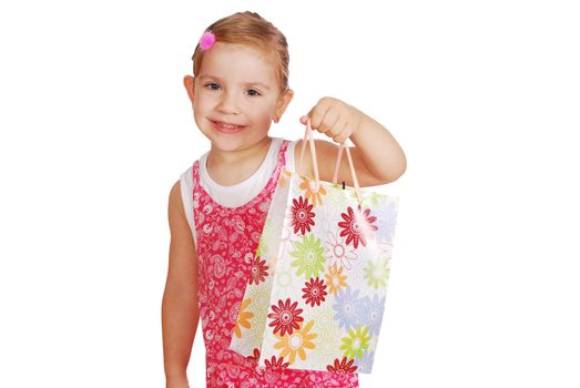 Little girl holding shopping bags studio shot