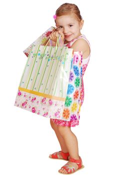 Little girl hold shopping bag studio shot