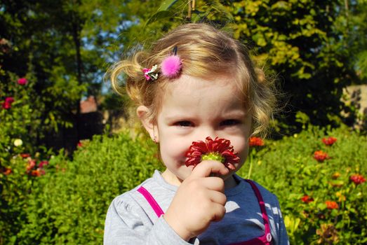 Beauty little girl with flower