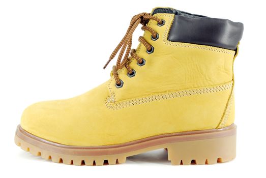Yellow hiking boot on white