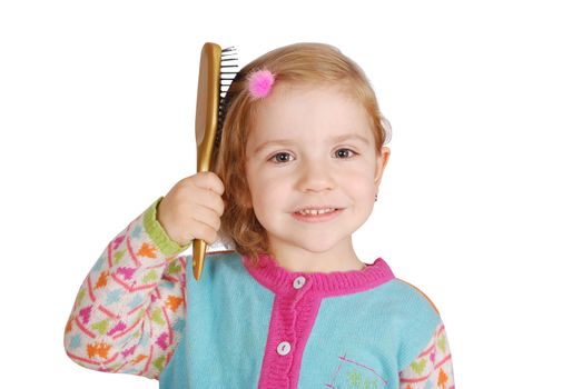 Beauty little girl comb her hair