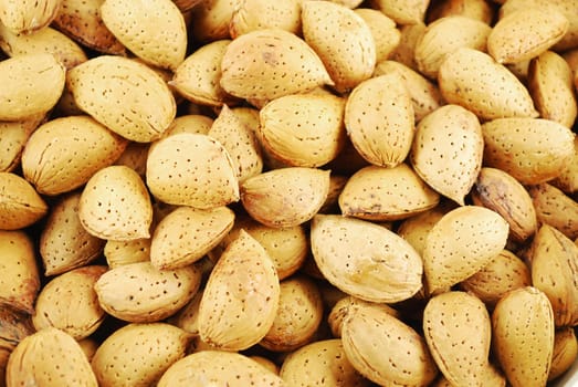 Raw food almond background closeup