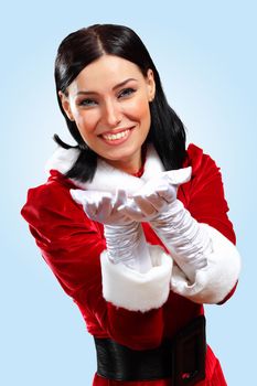 Santa Girl presenting your product, in costume and white gloves