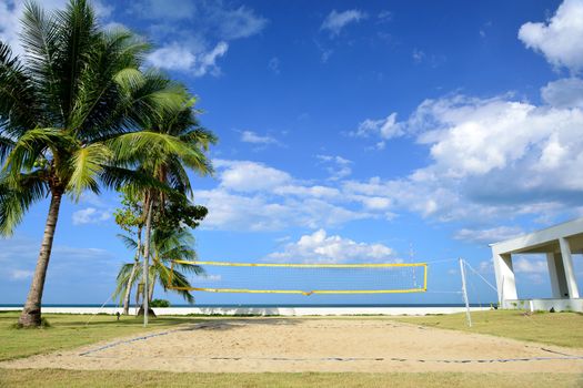 The beach volleyball field have blue sky to be background.