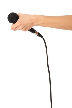 woman holding big black microphone for singing