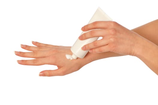 woman lubricates the hands skin with cosmetic cream