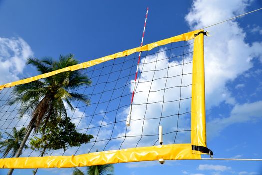 The net of beach volleyball have blue sky to be background