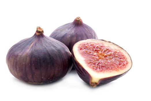 Two Figs and Slice Isolation on White Background