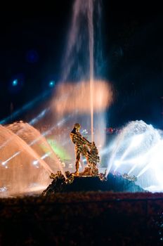 Samson fountain at night with big jet at Petergof, Russia
