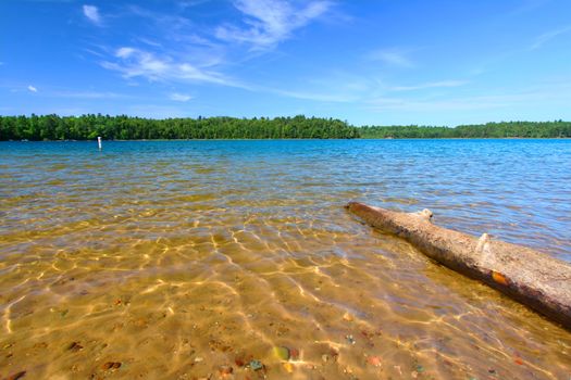 Beautiful swimming beach of Buffalo Lake in the Northern Highland American Legion State Forest of Wisconsin.