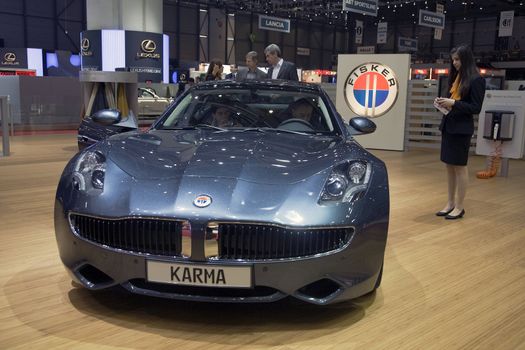 GENEVA, SWITZERLAND - MARCH 4, 2011 - Fisker Karma Plug-in Hybrid is presented at the annual motor show in Geneva on March 4, 2011.