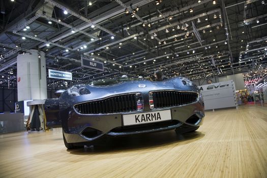 GENEVA, SWITZERLAND - MARCH 4, 2011 - Fisker Karma Plug-in Hybrid is presented at the annual motor show in Geneva on March 4, 2011.