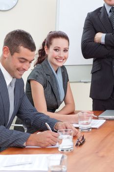 Young business people in a meeting with their manager