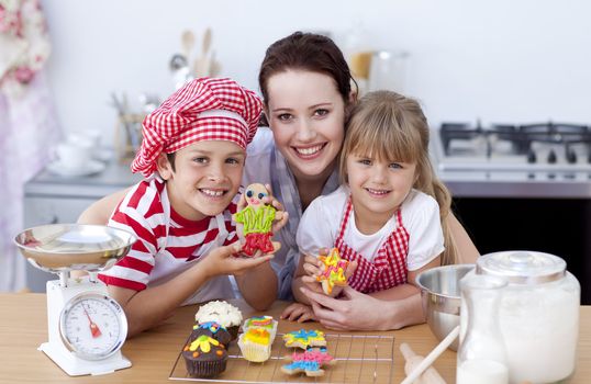 Mother and children baking in the kitchen all together