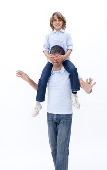 Father playing with his son against white background