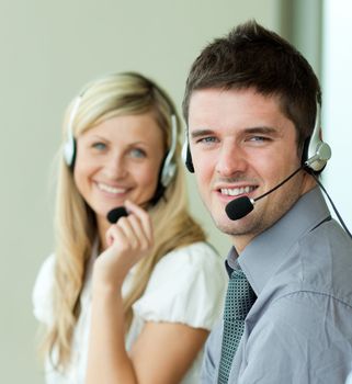 Young people with headsets at work