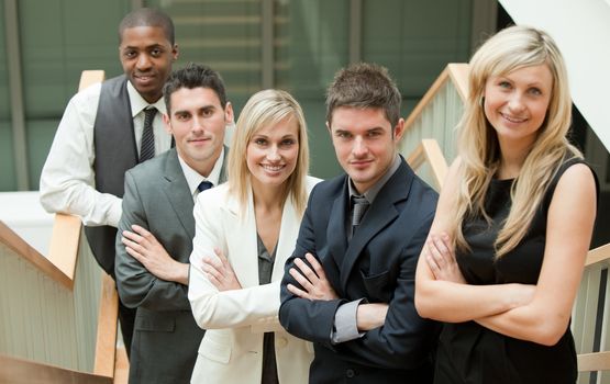 Business People with folded arms on stairs