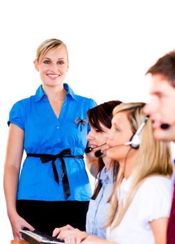 Businesswoman with her team in a call center 