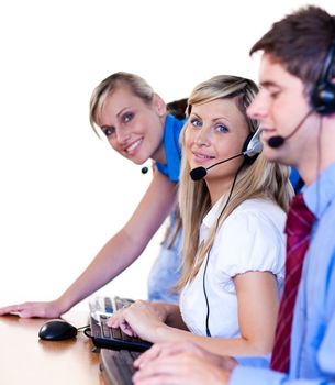 Manager and her team working in a call center 