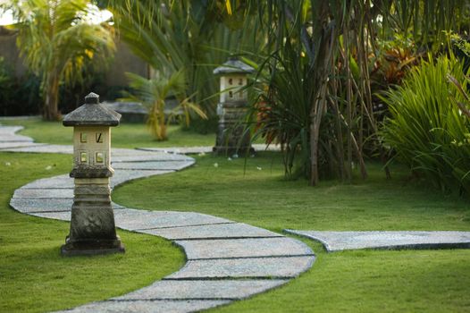 Curving traditional garden path in Bali, Indonesia