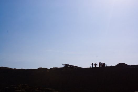 Tour group listening to their tour guide