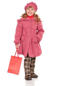 Portrait of a pretty little girl with bag. Isolated on white background.