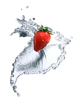 Red strawberry inside flowing water on white background