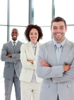 Beautiful young businesswoman with folded arms