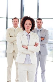 Serious and confident businesswoman with folded arms
