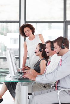 Leader managing her team in a call center