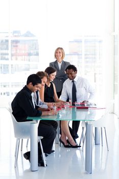 Female leadership with her team in a meeting