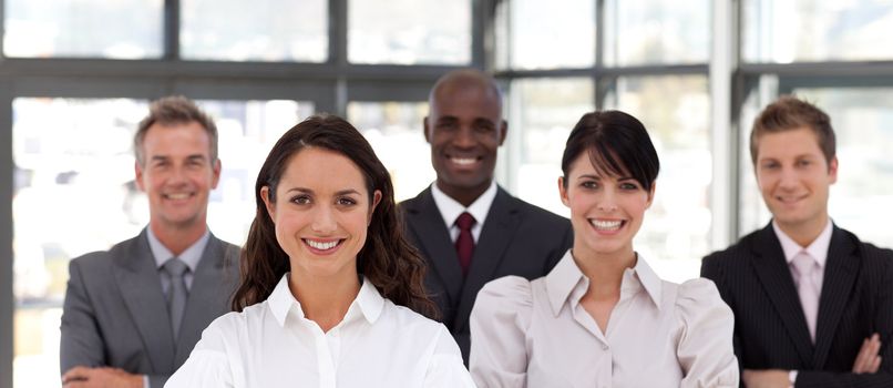 Diverse Business partners standing in a line in front of the camera 