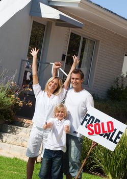 Happy family buying a house 