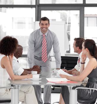 Young Attracitve Businessman giving a presentation