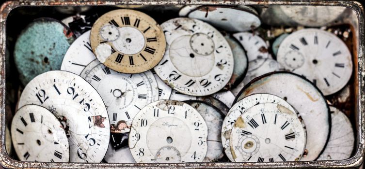 many old broken antique watches. shallow DOF