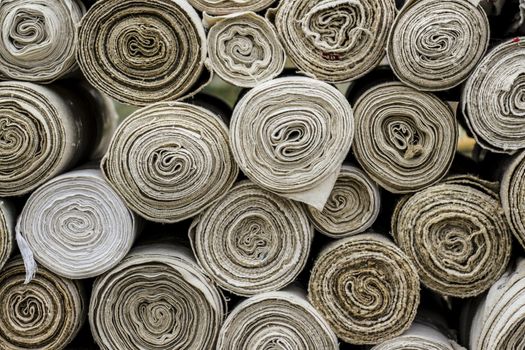 Rolls of textile materials in a fabrique