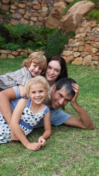 Lovely family resting in a garden