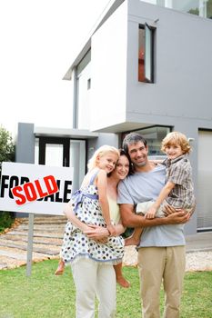 Happy family buying a house